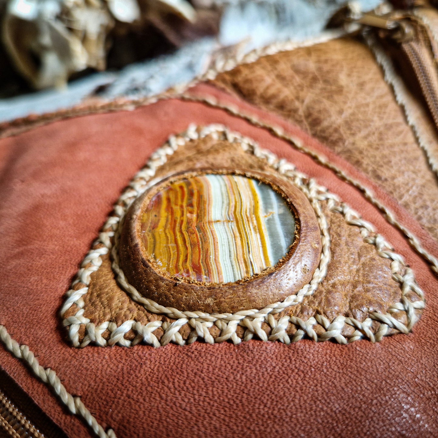 bright brown and red leather bag