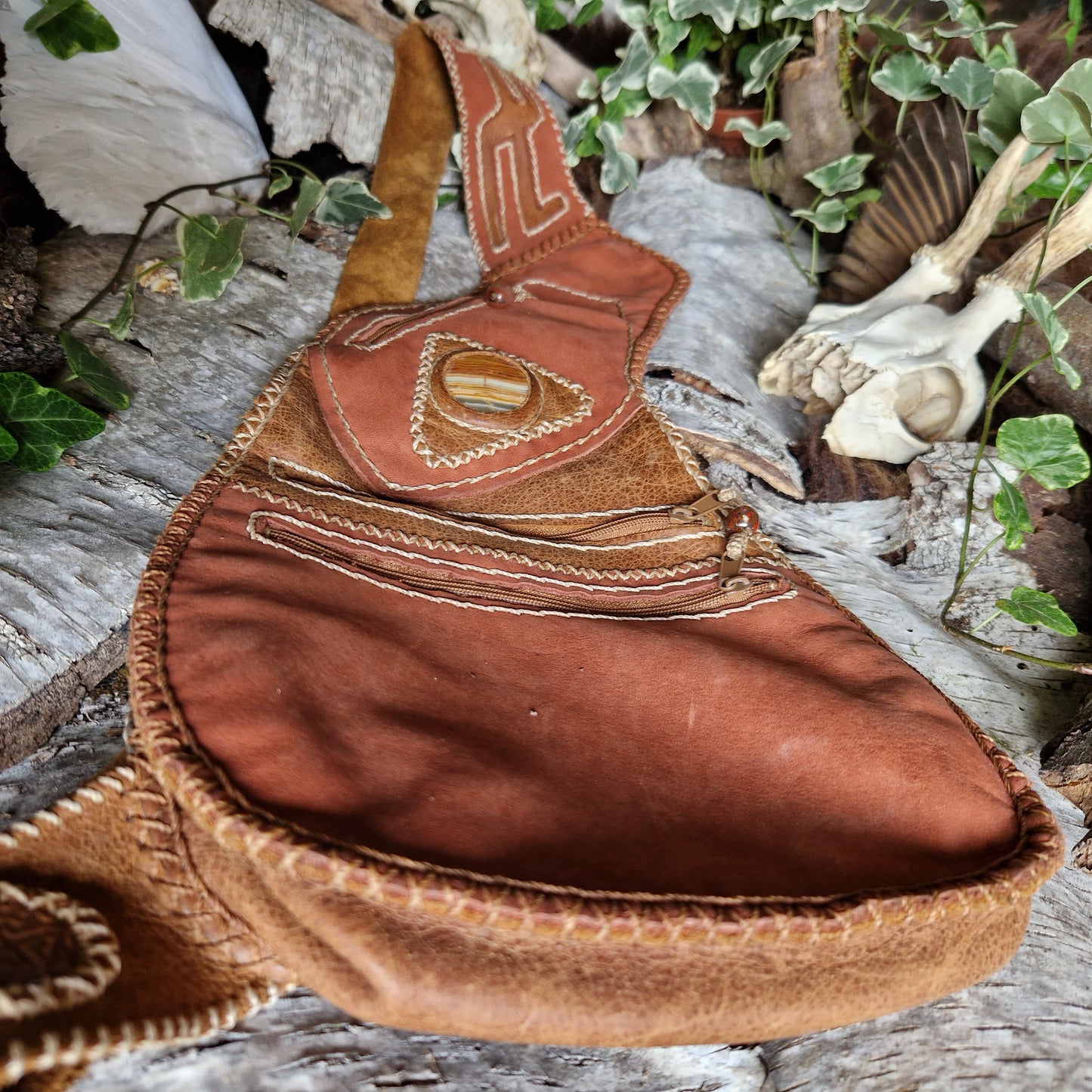 bright brown and red leather bag