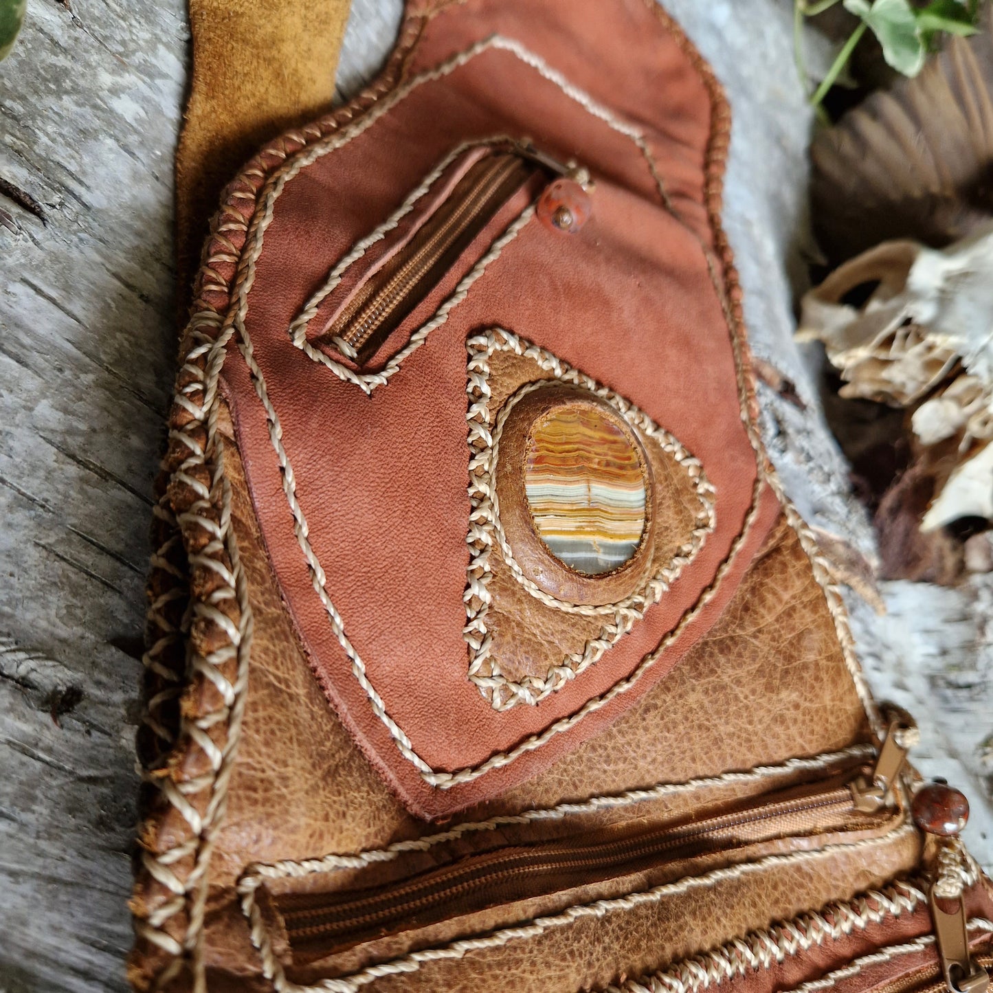 bright brown and red leather bag