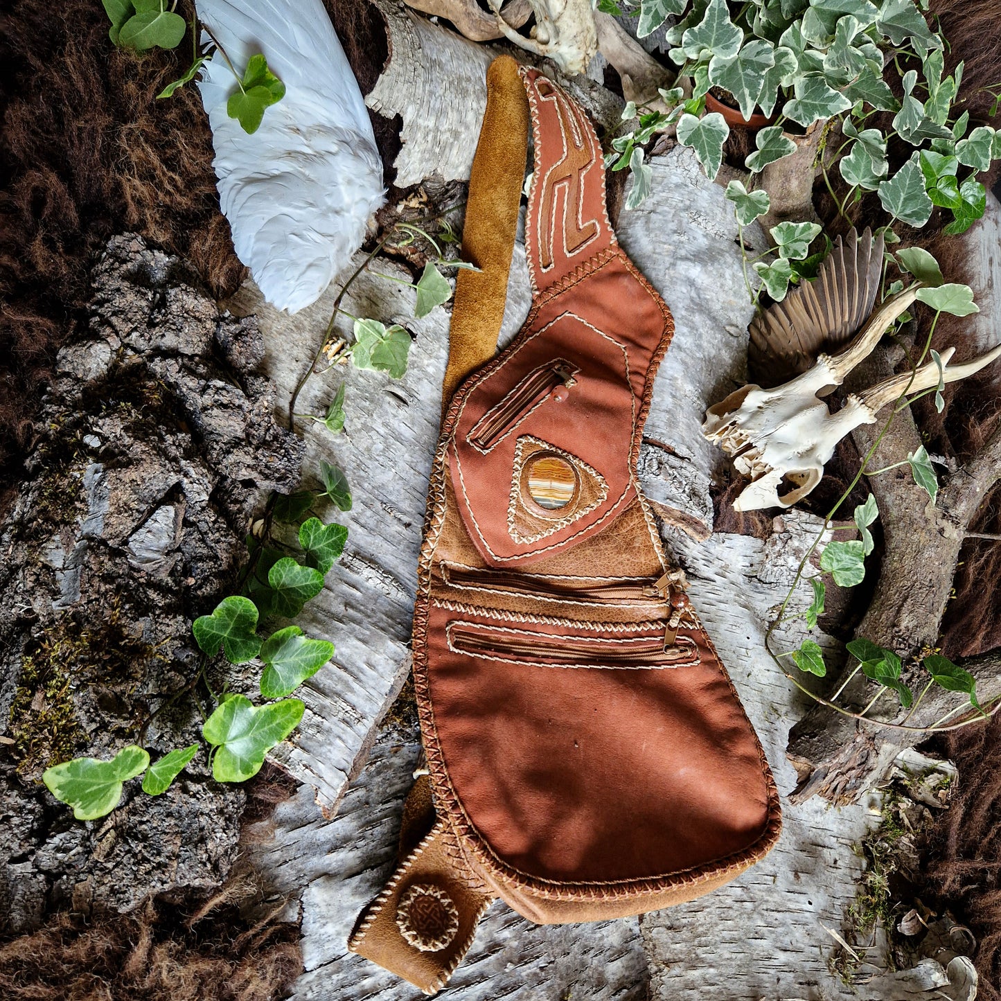 bright brown and red leather bag