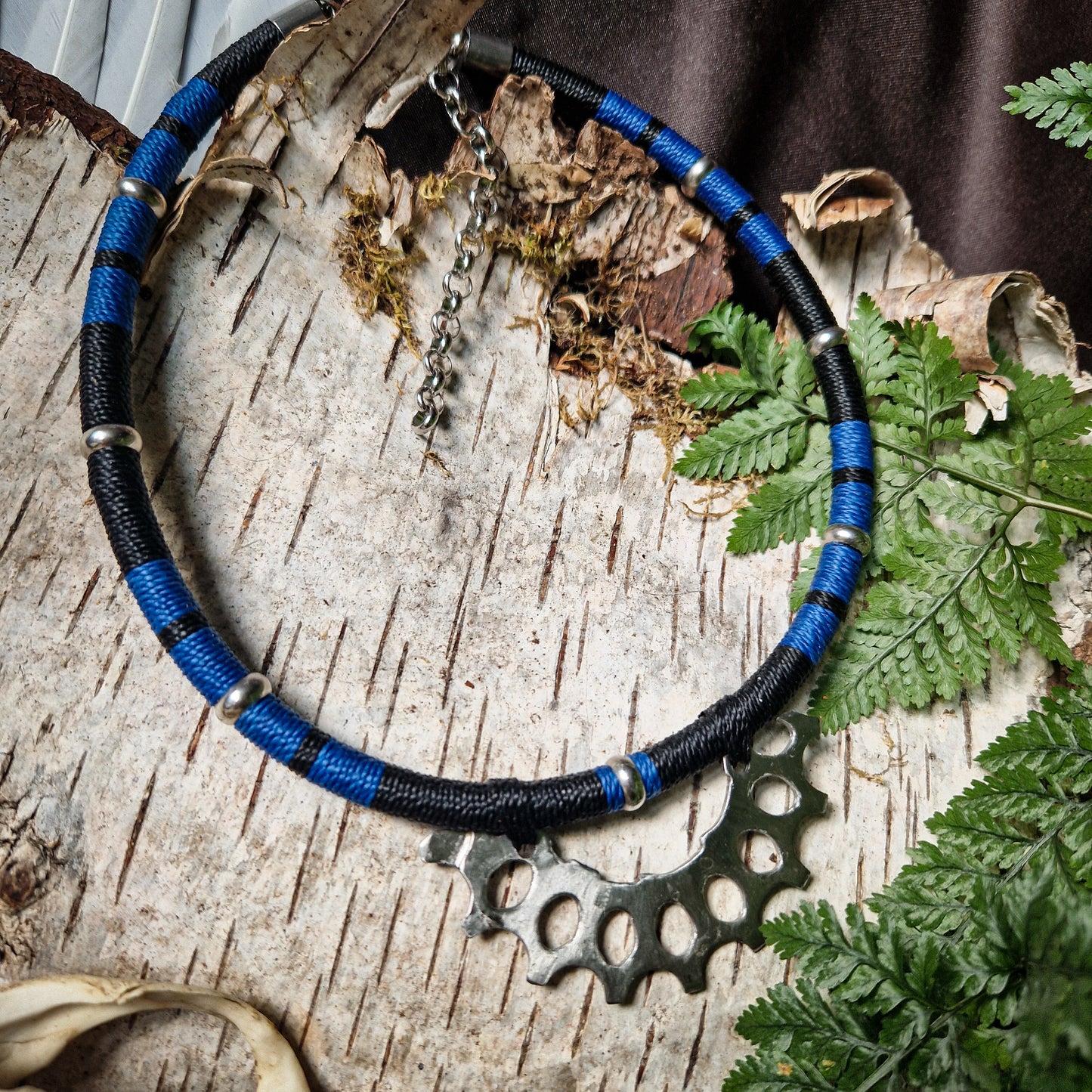 Blue and black gear necklace