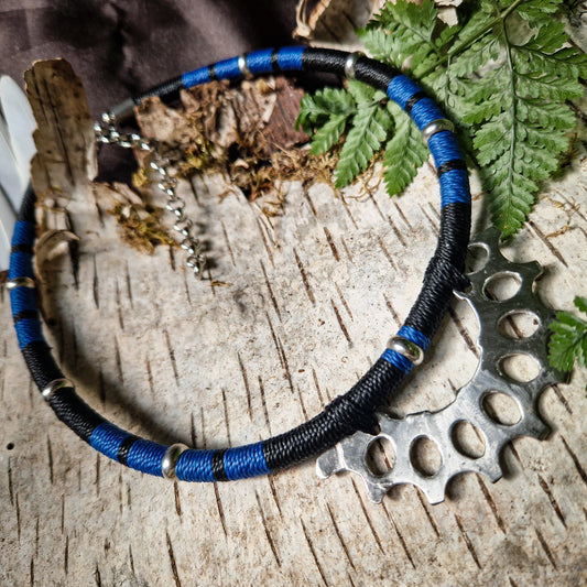 Blue and black gear necklace