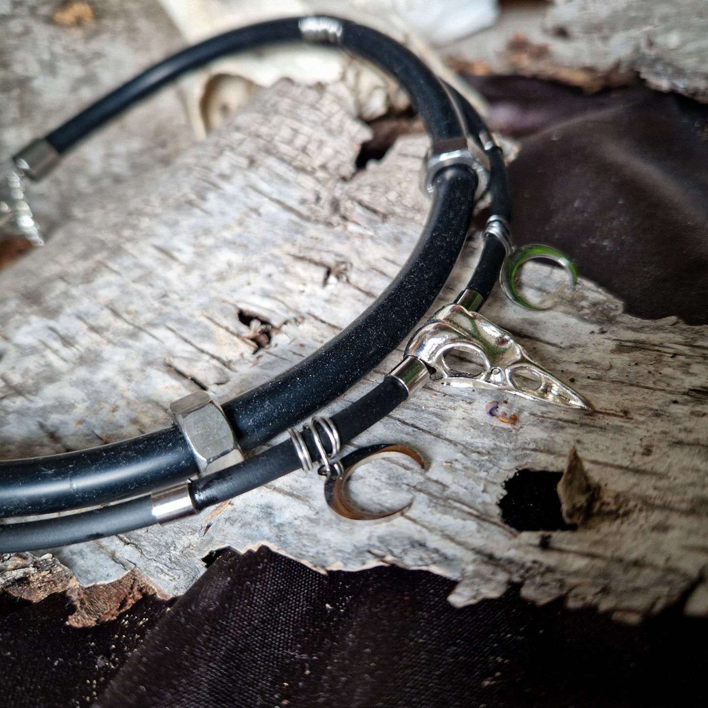 Simple black and silver raven necklace