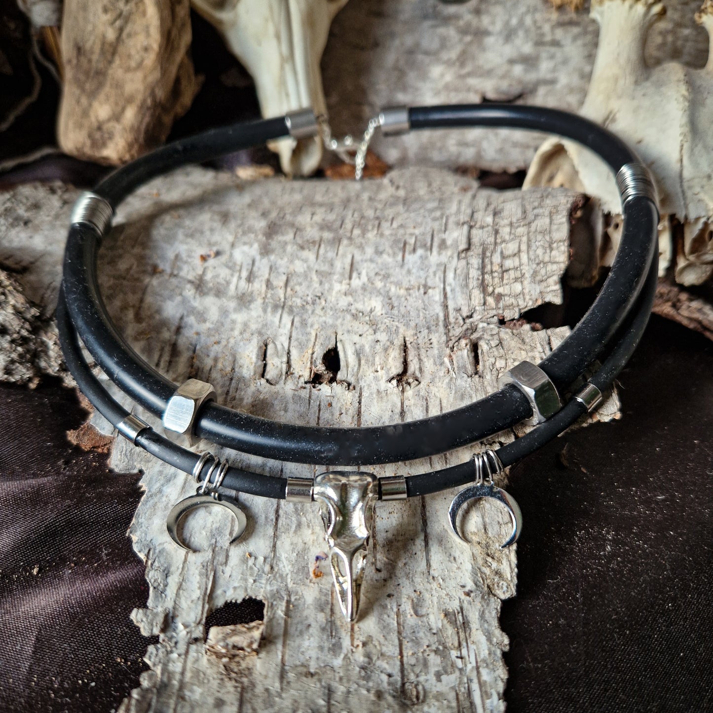 Simple black and silver raven necklace